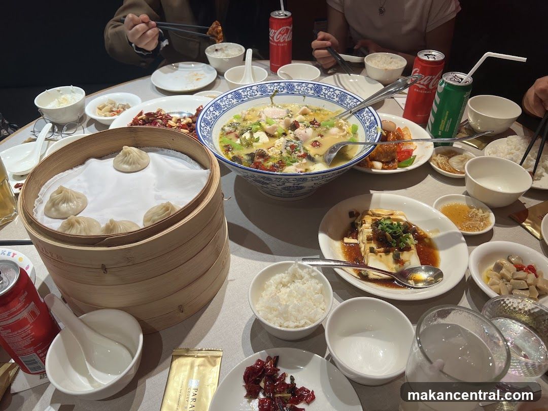 Table with various Chinese dishes