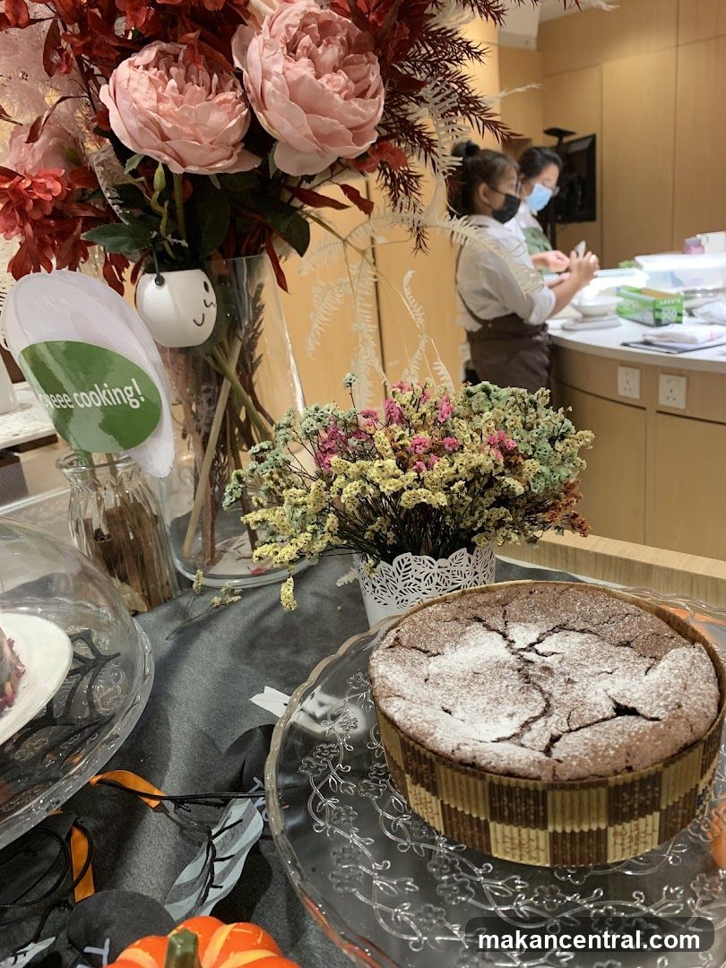 Dessert Display with Bakers in Background