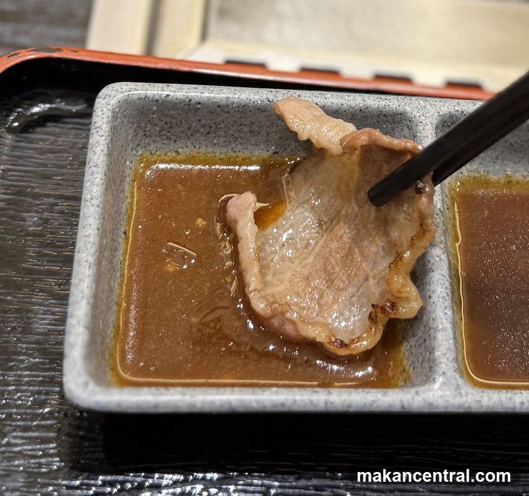 Dipping Meat in Sauce