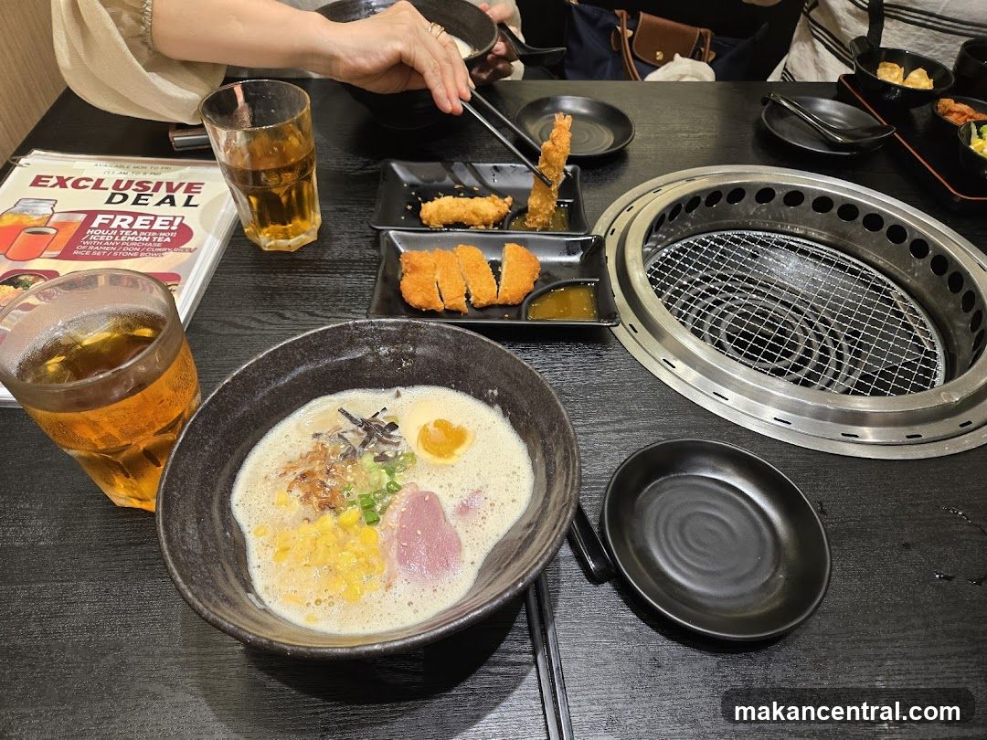 Table with Ramen and Fried Food
