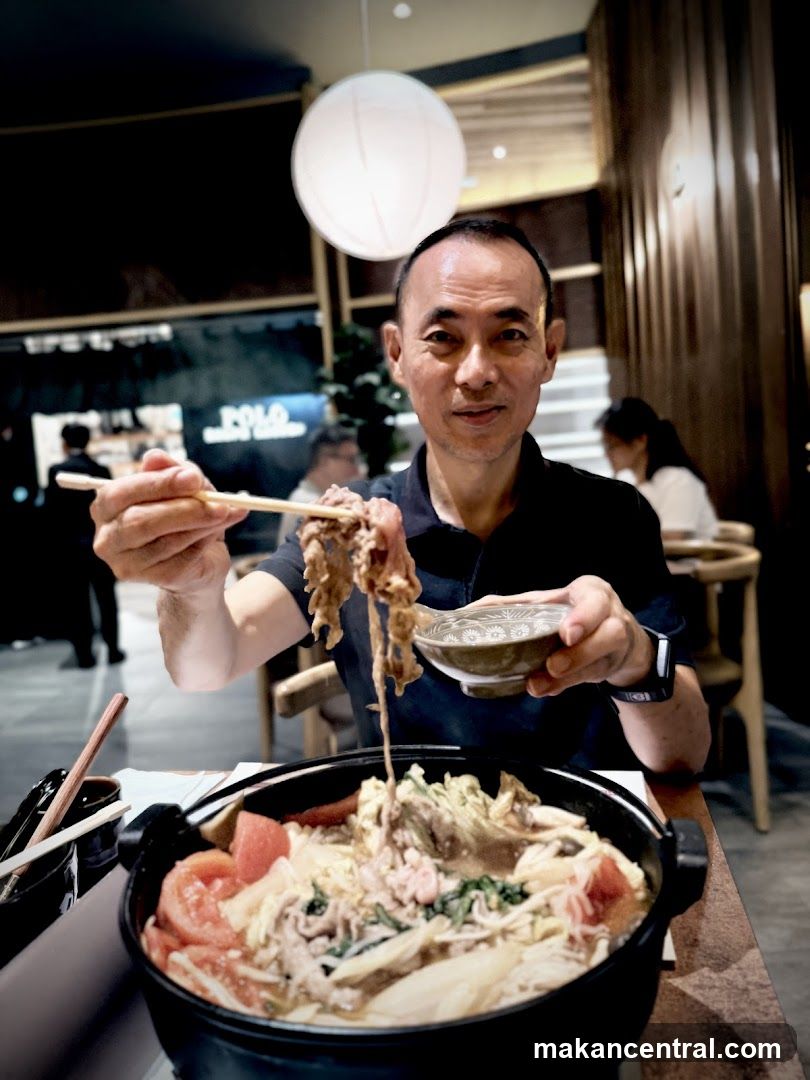 Man eating hot pot