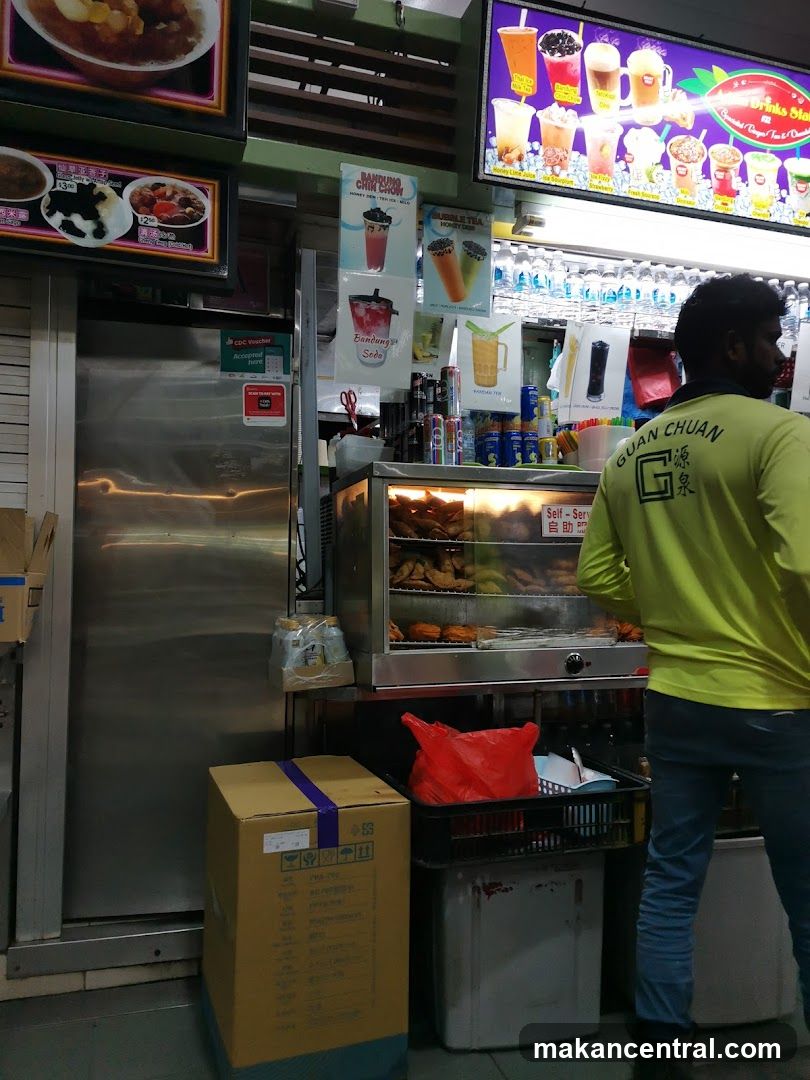 Food Stall with Drinks and Fried Food