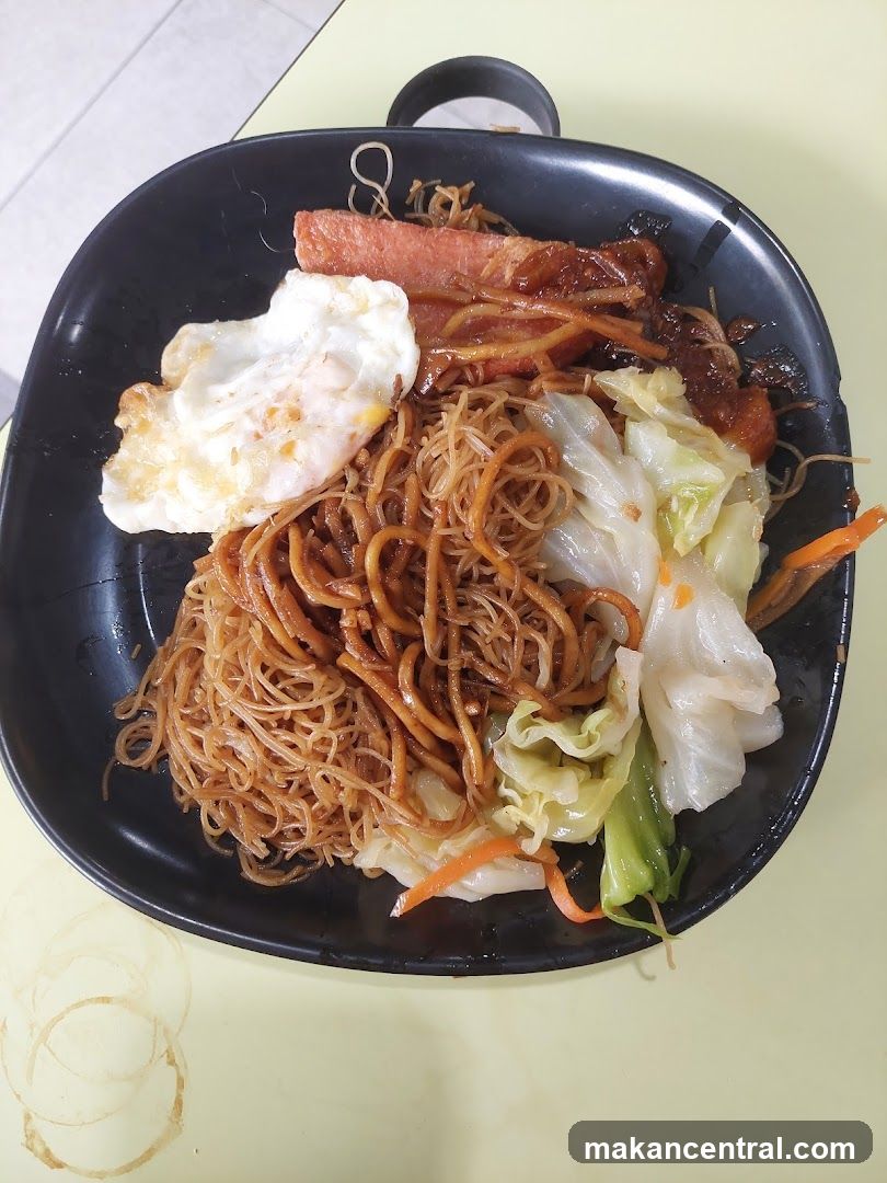 Fried Noodles with Fried Egg and Luncheon Meat