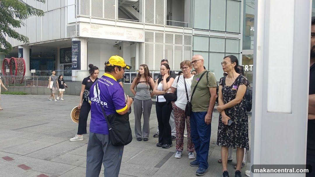 Tour Guide Addressing Group