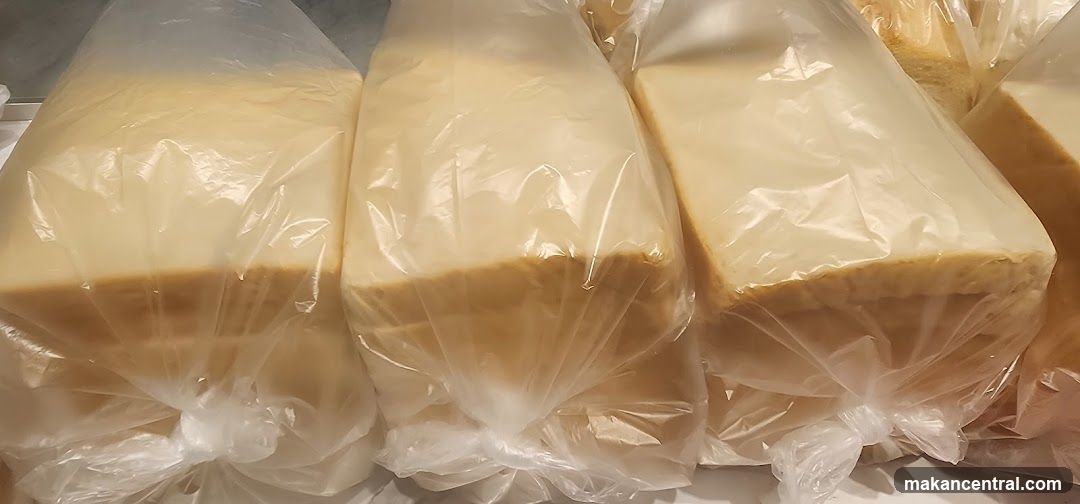 Loaves of Bread in Plastic Bags