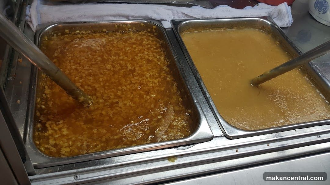 Two Chafing Dishes of Food