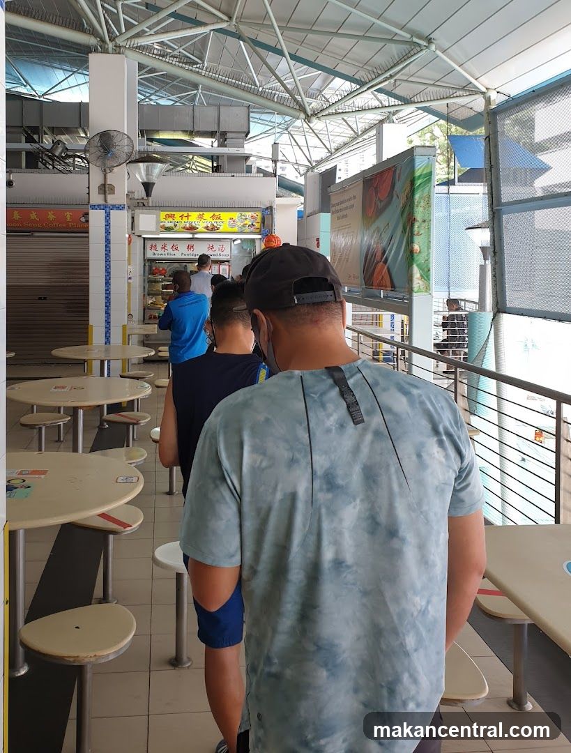 People queuing at a food court