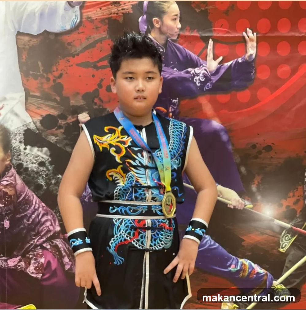 Young martial artist with medal