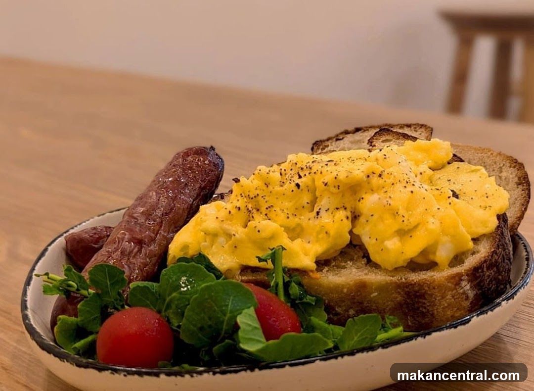 Scrambled Eggs on Toast with Sausage
