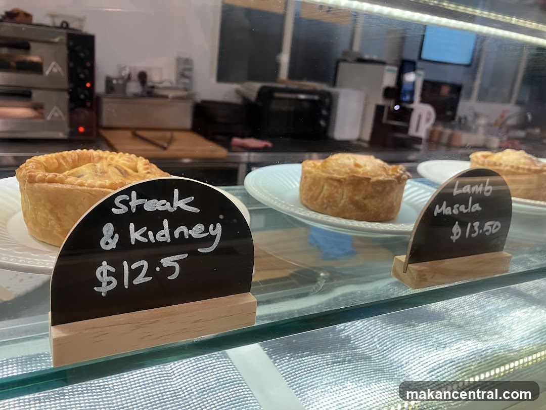 Pies in a display case