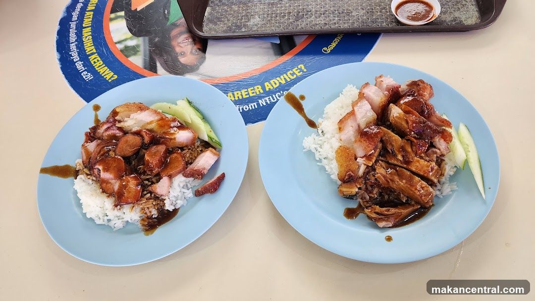 Two plates of roasted meats with rice