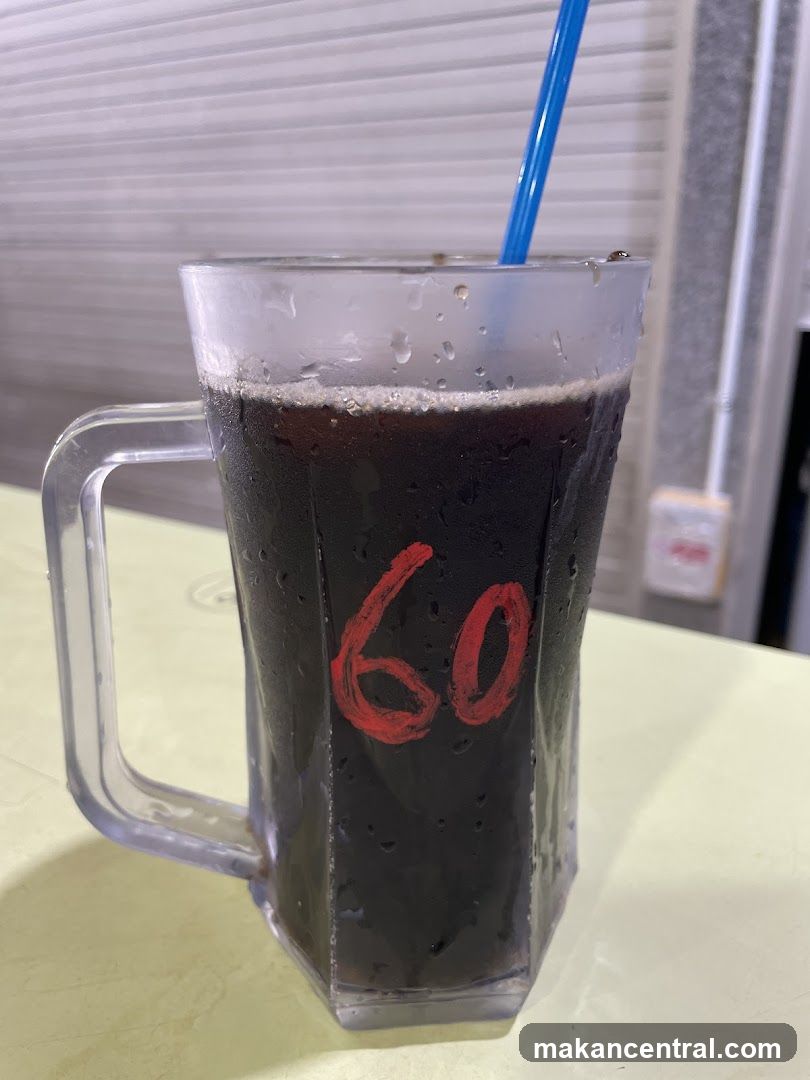 Iced Drink with "60" Written on Mug