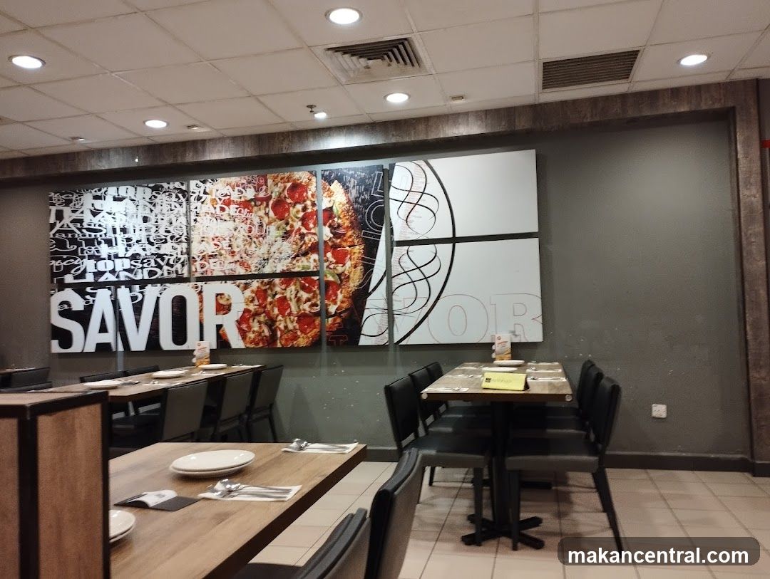 Restaurant Interior with Pizza Mural