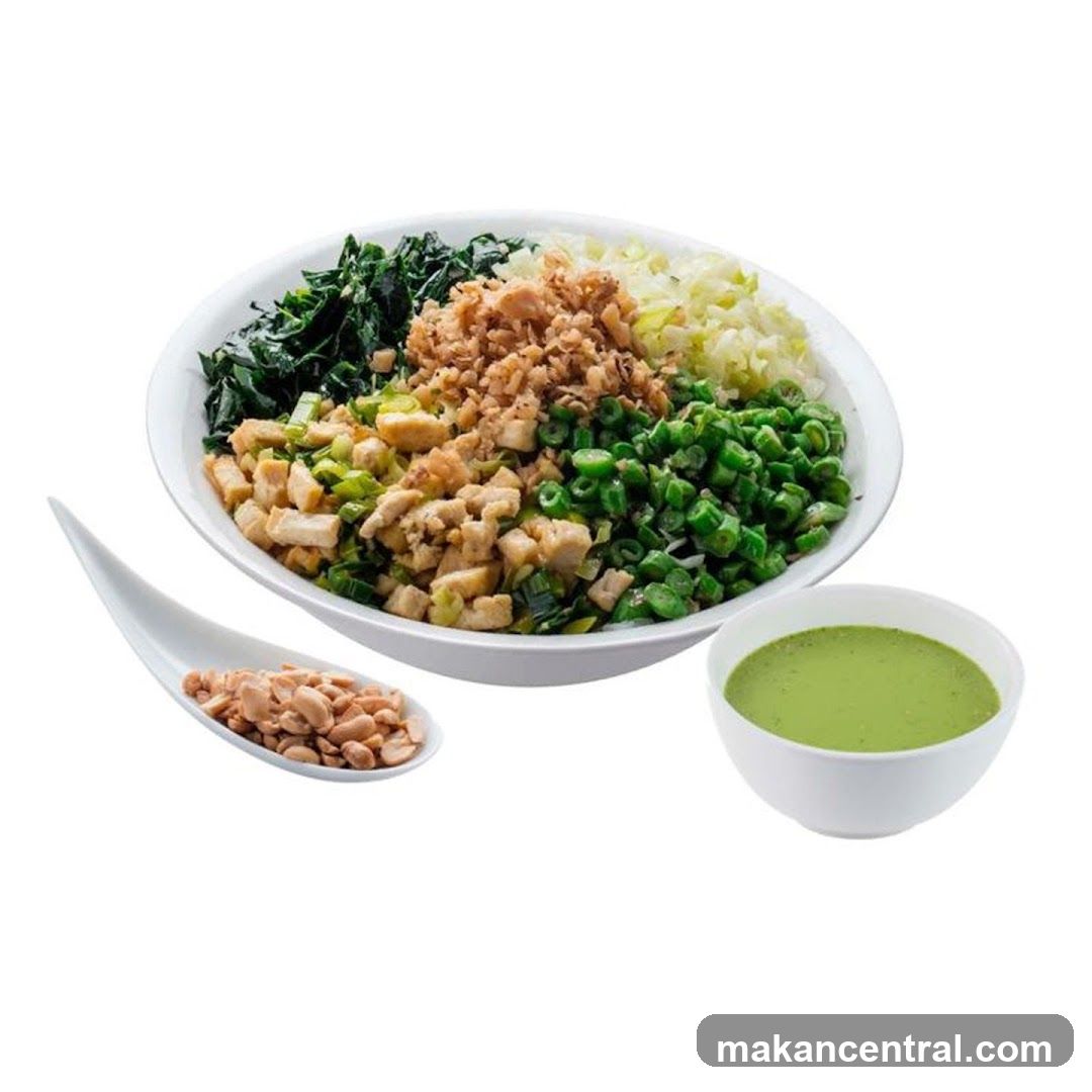 Bowl of Mixed Ingredients with Sauce and Peanuts