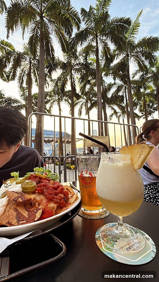 Nachos and Drinks at a Tropical Venue