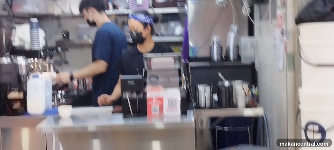 Baristas preparing drinks