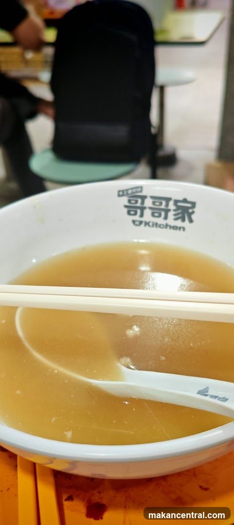 Bowl of Soup with Chopsticks