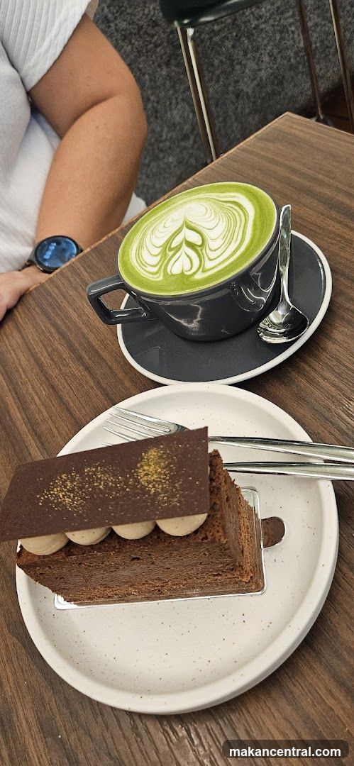 Matcha latte and chocolate cake