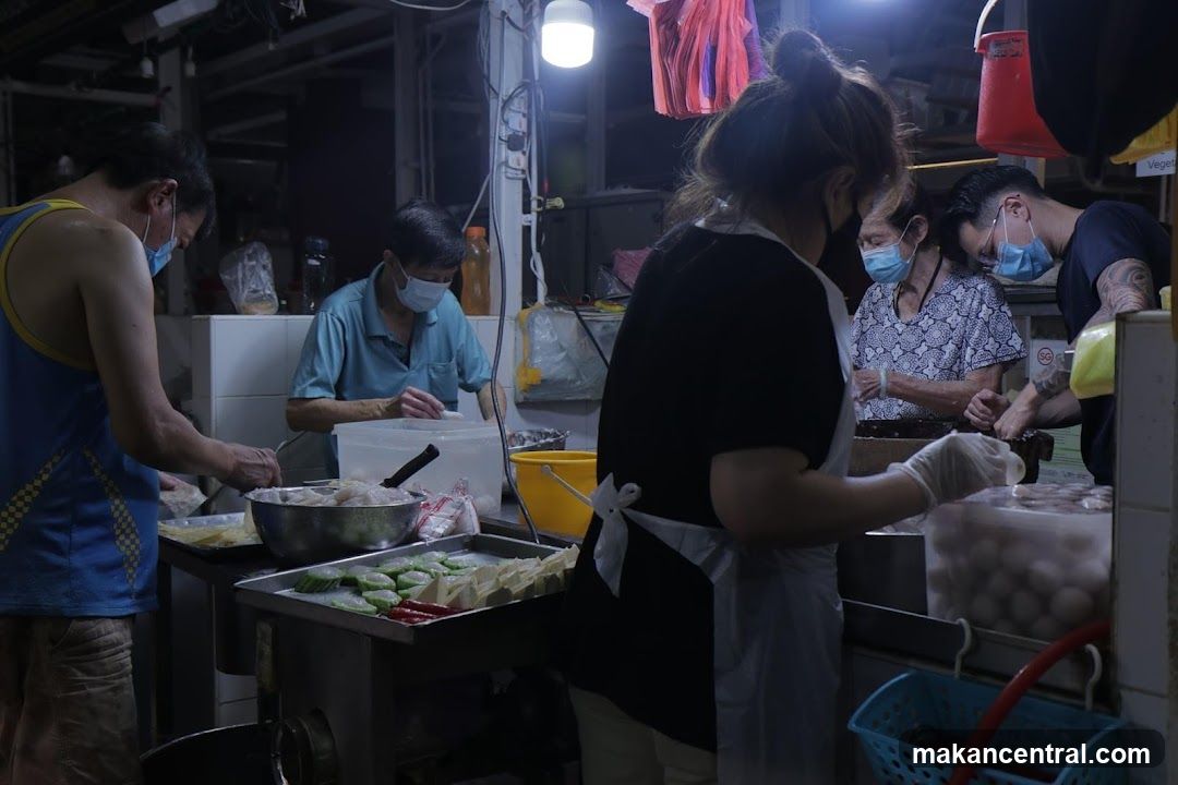 Food preparation at a market stall