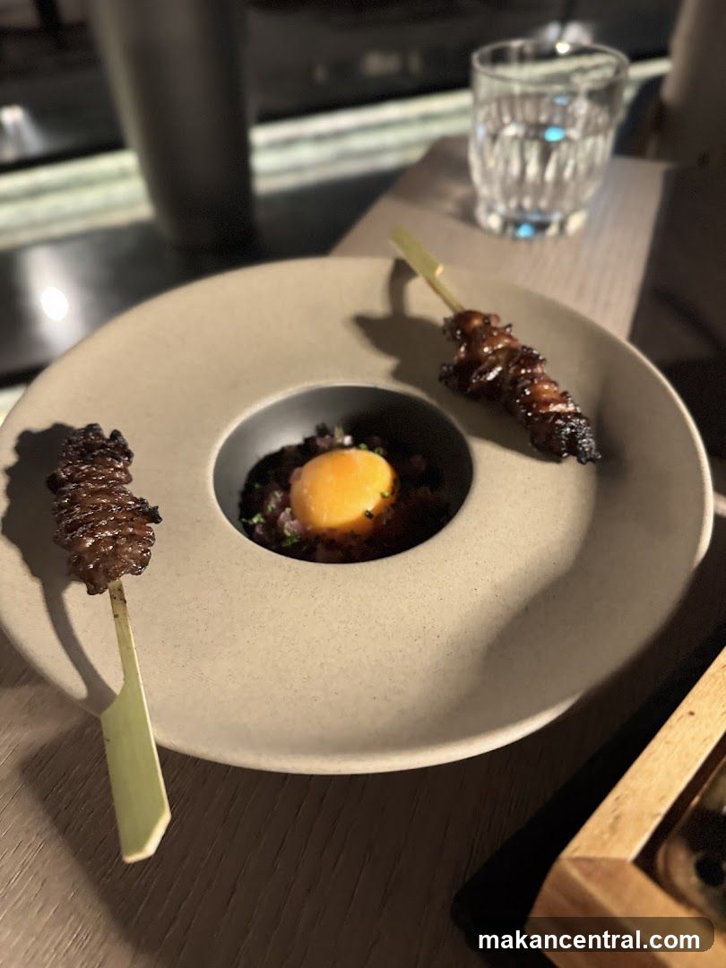 Gourmet Dish with Egg Yolk and Skewers