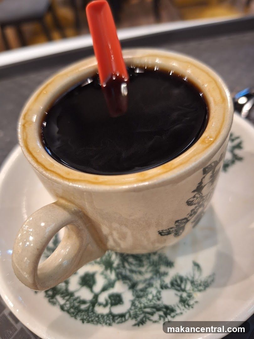 Coffee with Red Stirrer
