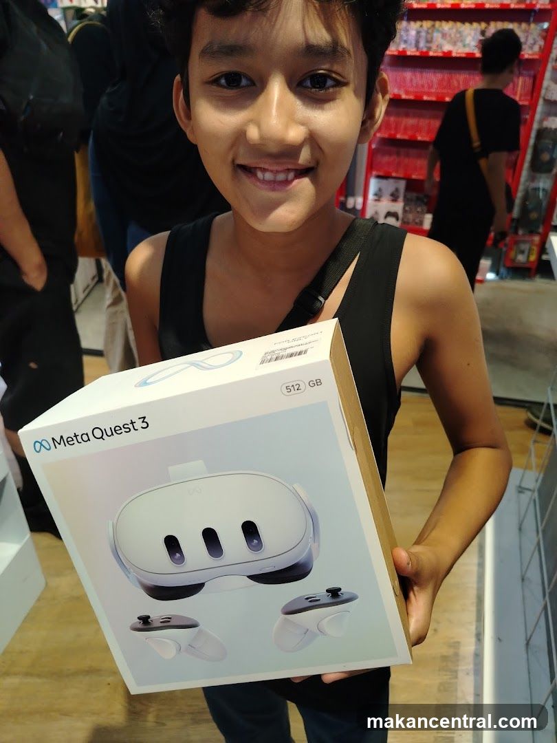 Young person holding a Meta Quest 3 box
