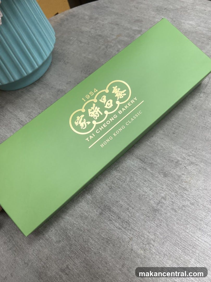Green box with gold lettering