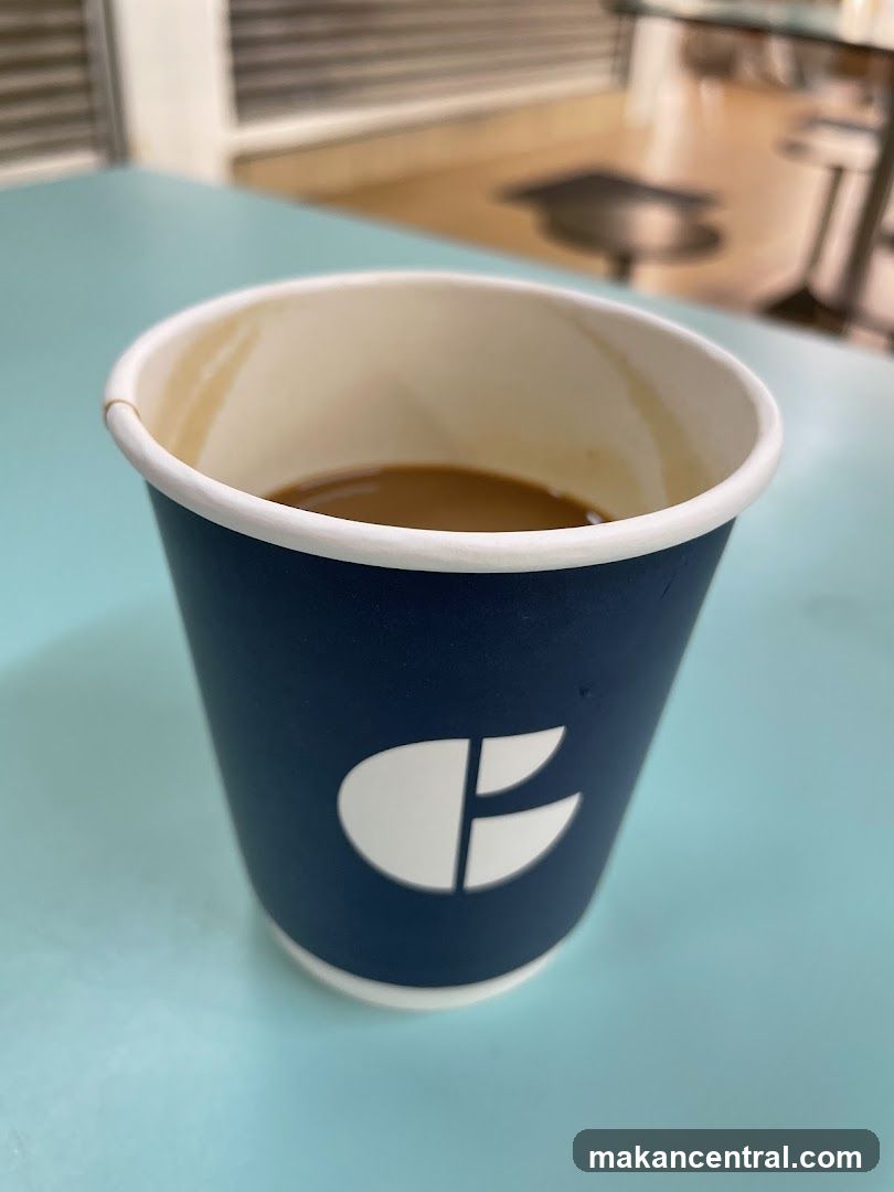 Coffee in a branded cup