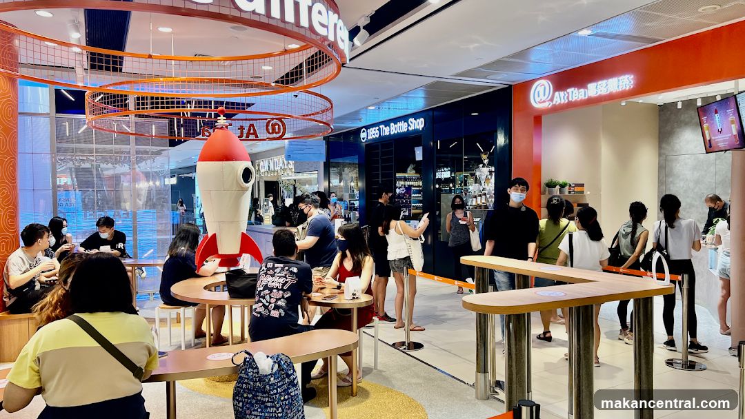 Interior of a bubble tea shop with customers