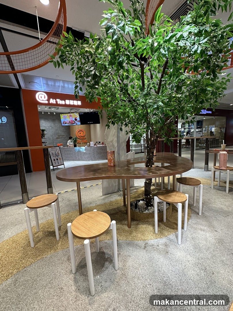 Interior seating area with a decorative tree