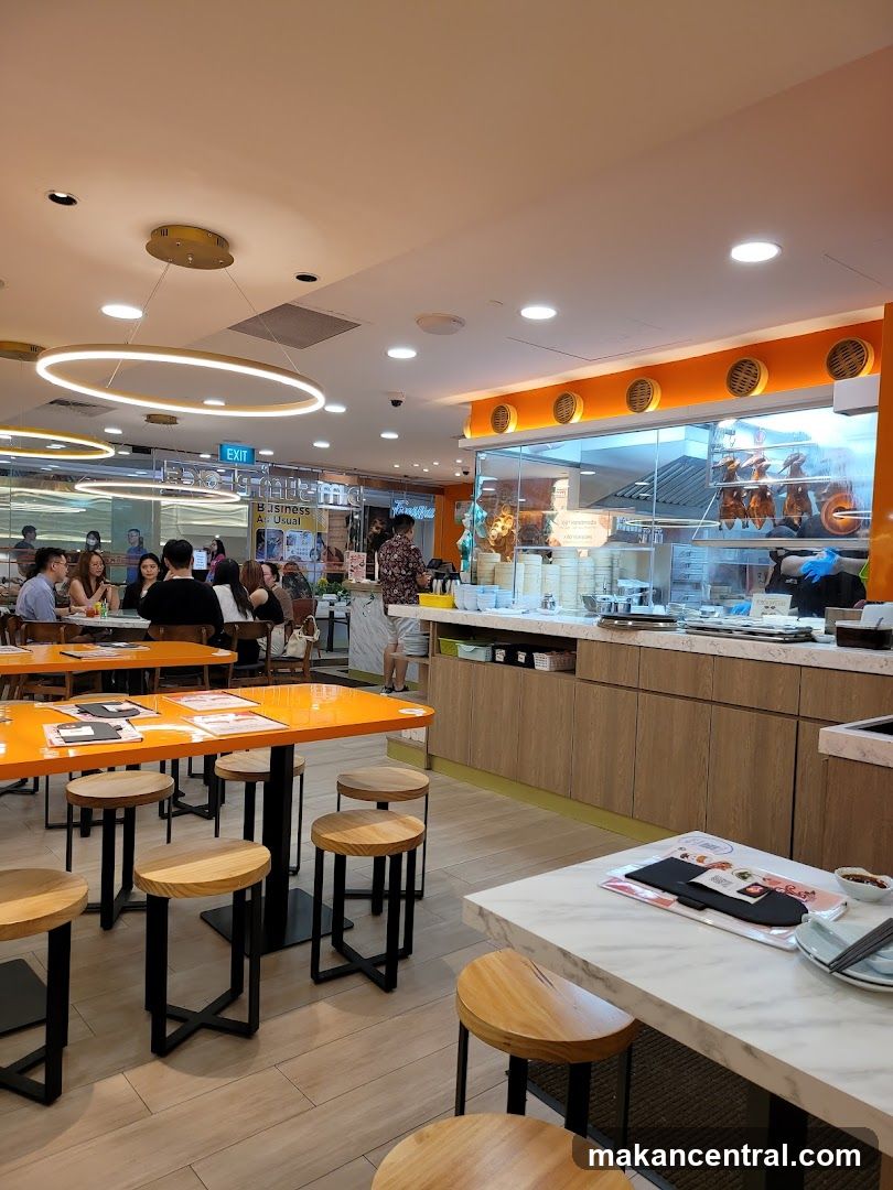 Restaurant Interior with Dining Tables and Kitchen Counter