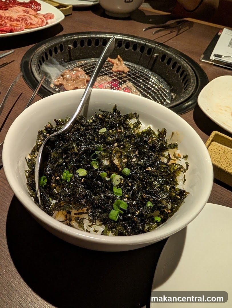 Bowl of Rice with Seaweed and Green Onions