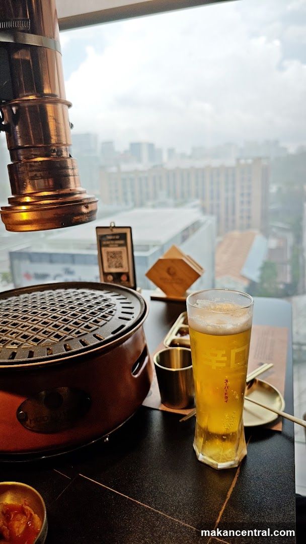 Table setting with beer and grill