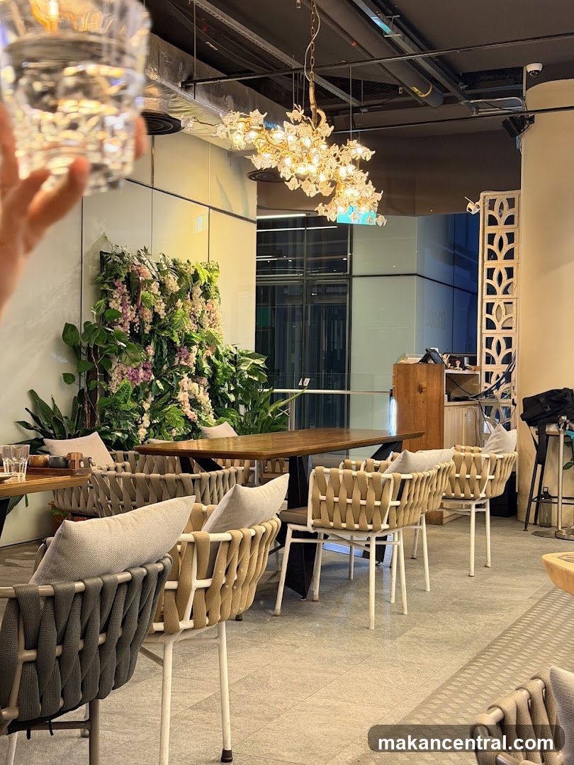Restaurant Interior with Green Wall and Modern Seating