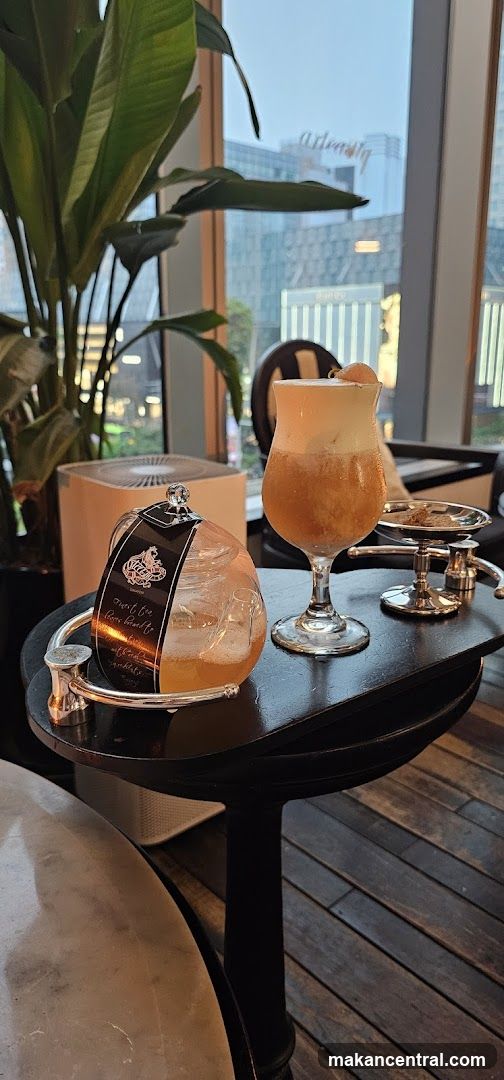 Table with drinks and teapot