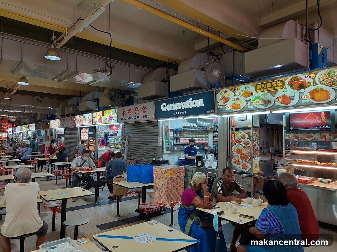 Food court with various stalls and dining tables