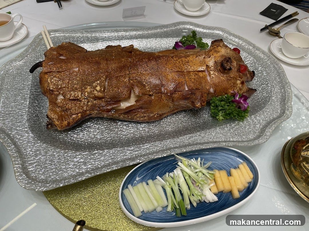 Whole Roasted Pig with Accompaniments