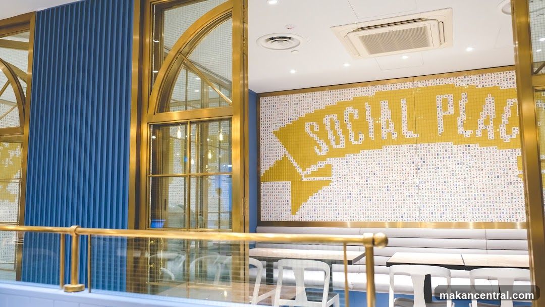 Interior of a restaurant with mosaic wall art