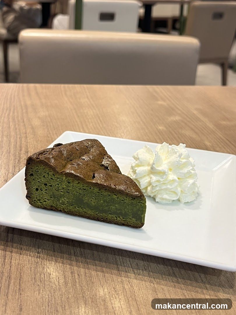 Matcha cake with whipped cream