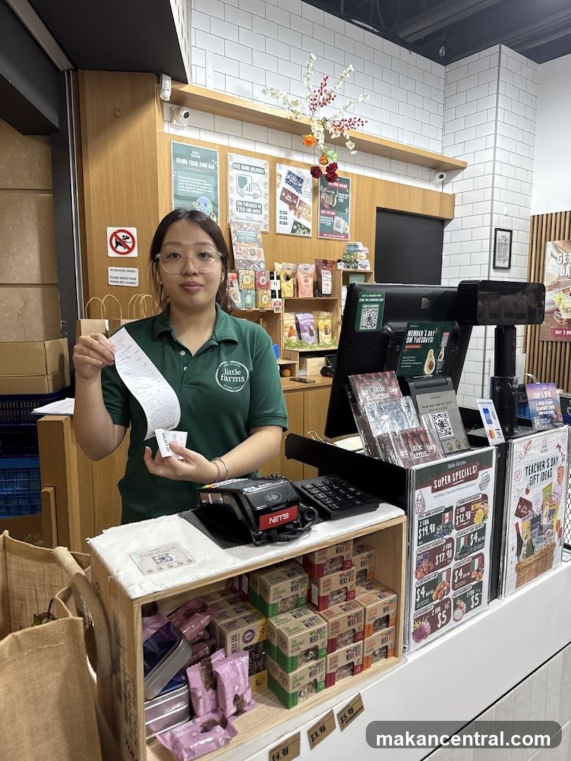 Cashier holding a receipt