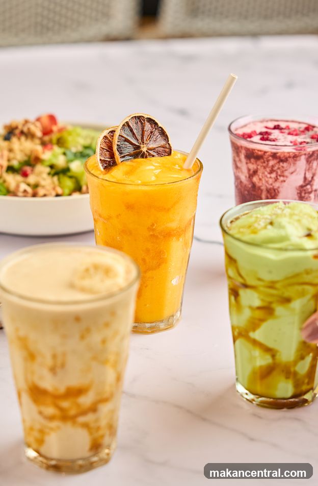 Assortment of Smoothies and Salad