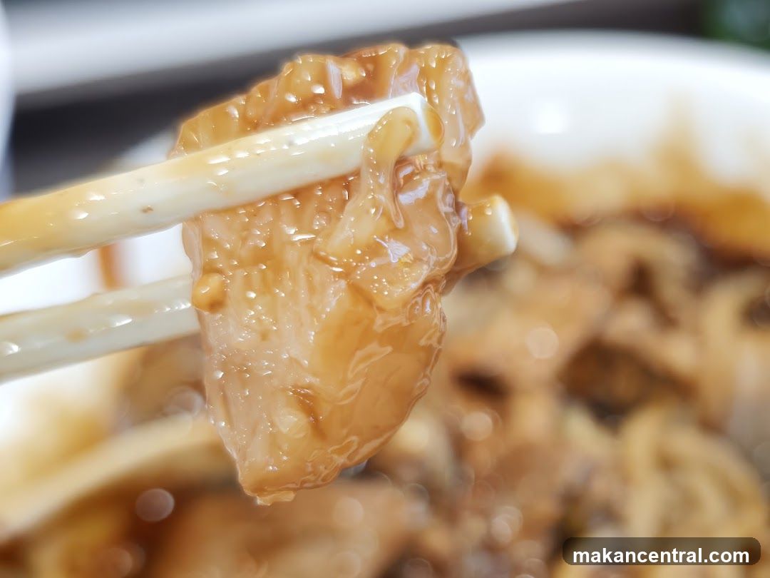 Chopsticks holding food
