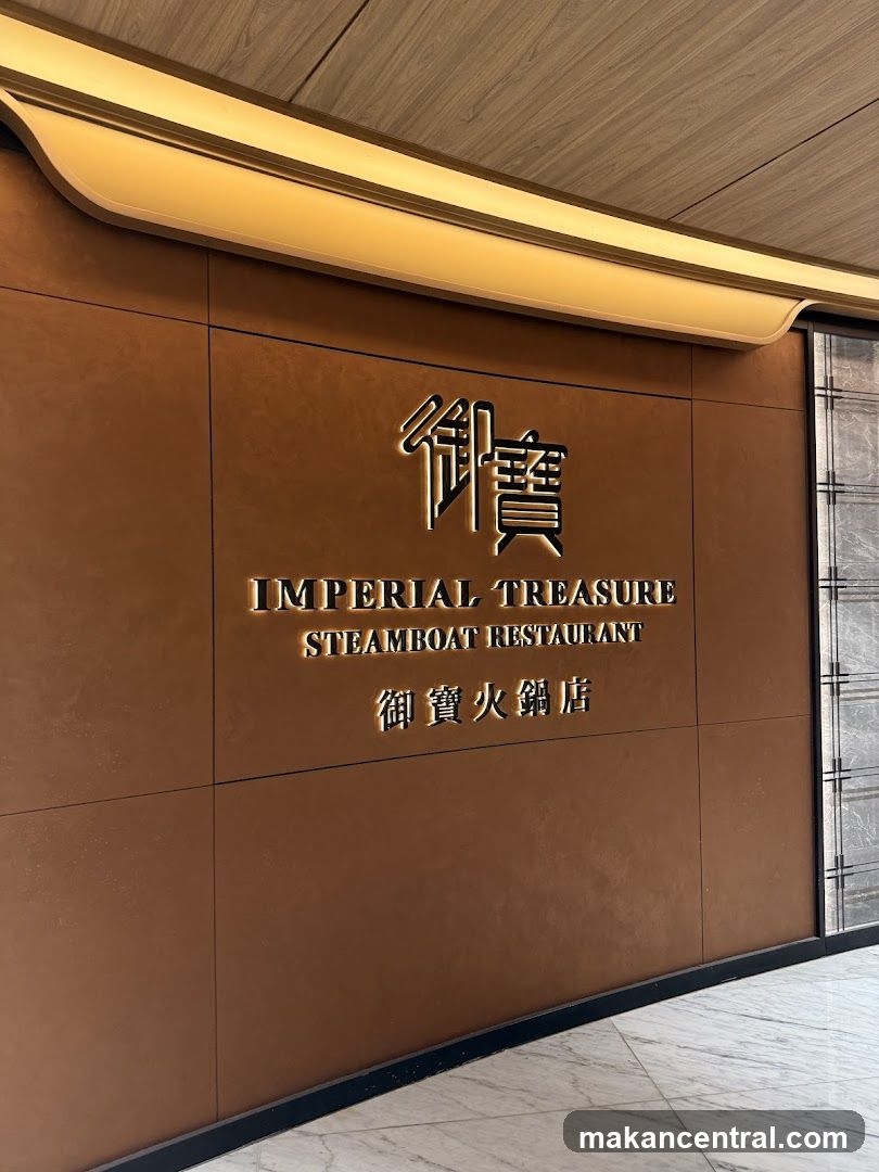 The exterior of a restaurant with a brown tiled facade. The restaurant's name,