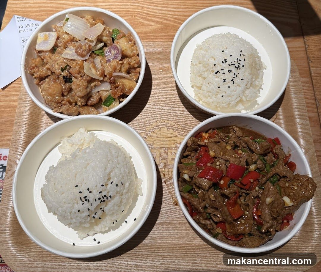 Four bowls of food on a tray