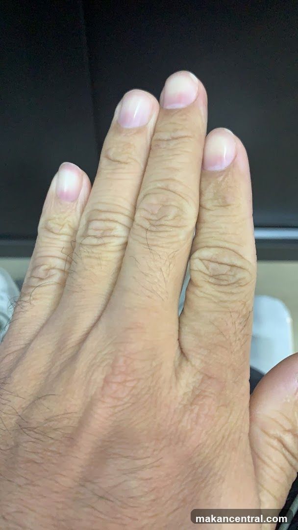 Hand with visible fingernails