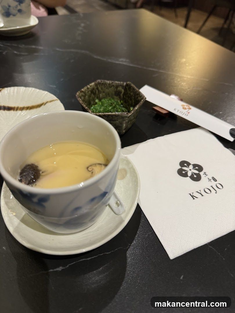 Chawanmushi with seaweed salad and chopsticks