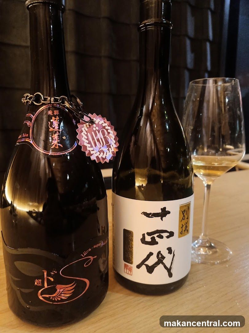Sake Bottles and Wine Glass