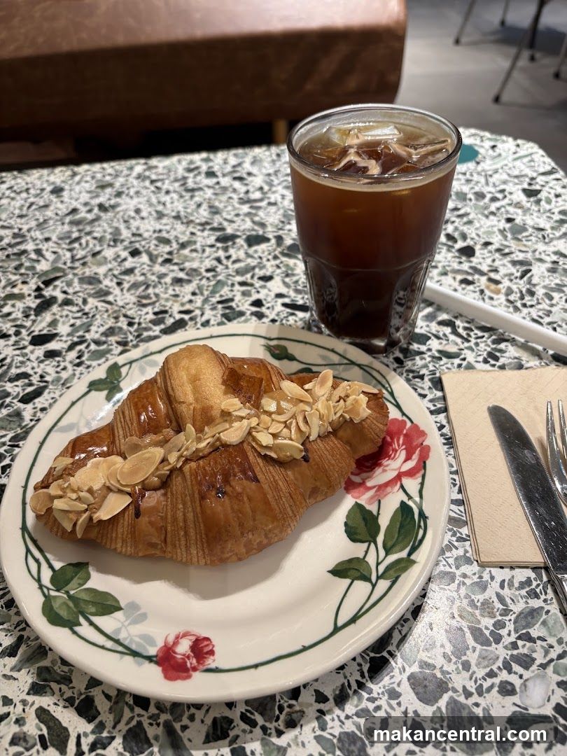 Almond Croissant and Iced Coffee
