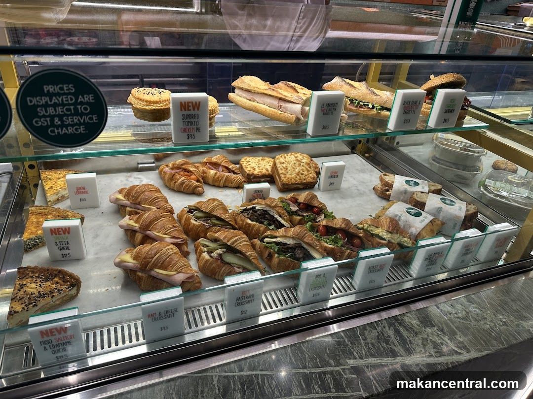 Sandwiches and pastries in a display case
