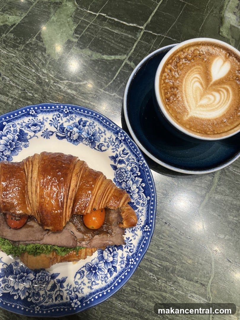 Croissant Sandwich and Latte